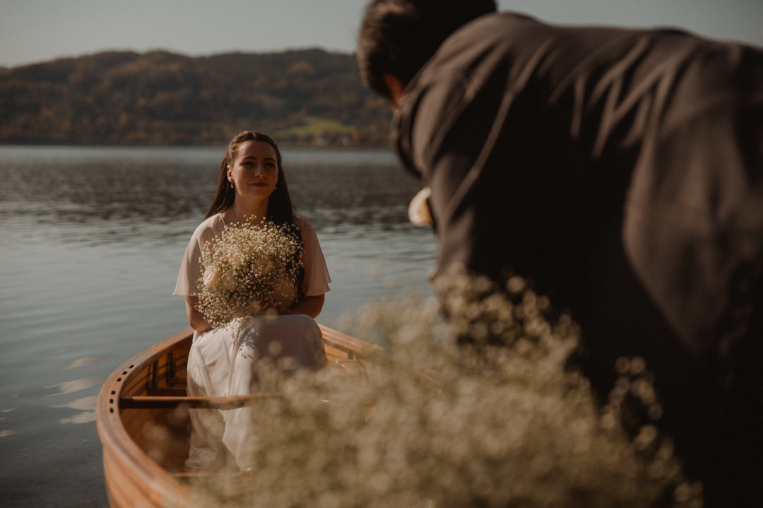 Hokkaido Elopement - The couple taking a boat ride 