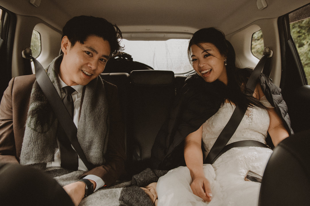 Japan Roadtrip Elopement - Couple in the car to head to next location 