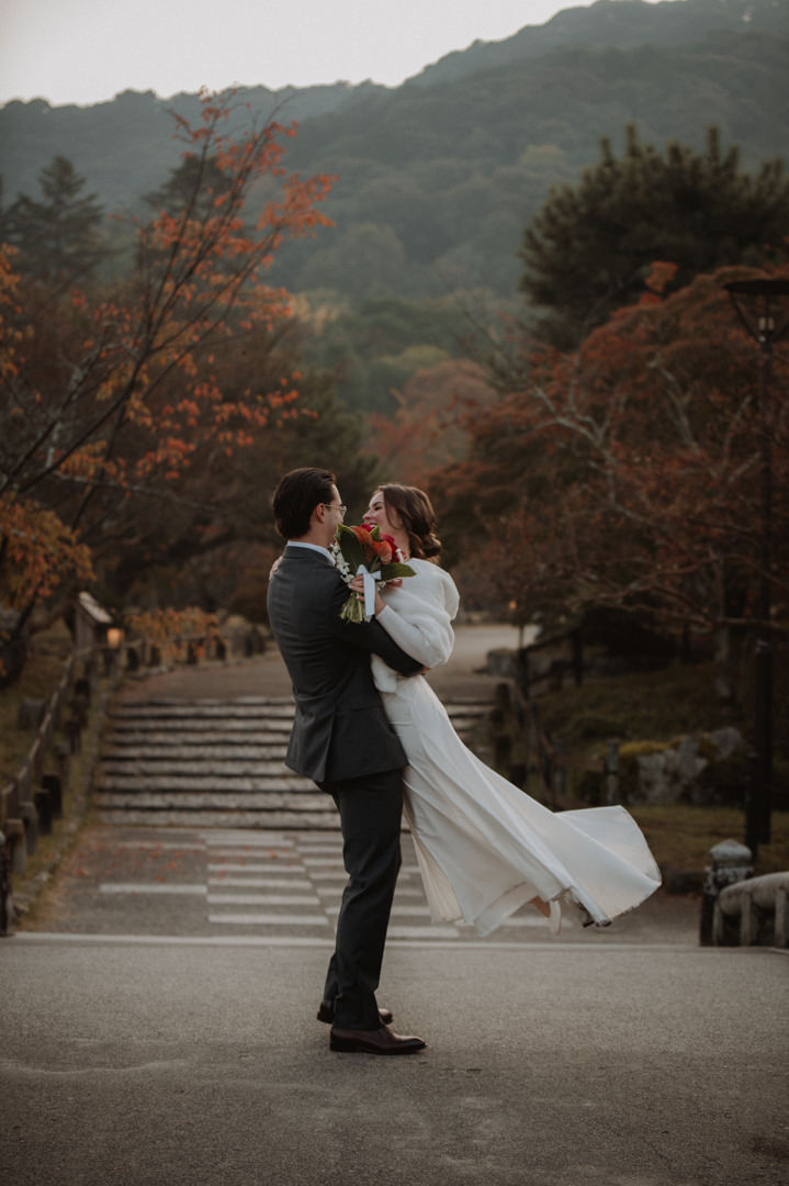 Private Elopement Kyoto - Groom is lifting up bride