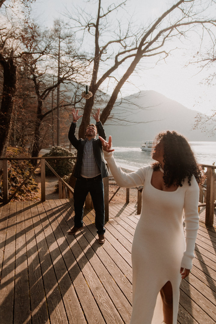 laid-back elopement in japan - bouquet toss