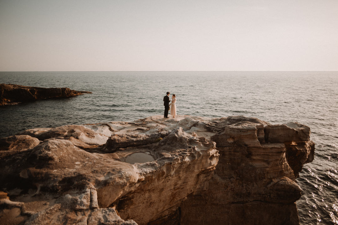 low-key elopement in japan - ceremony at the cliff