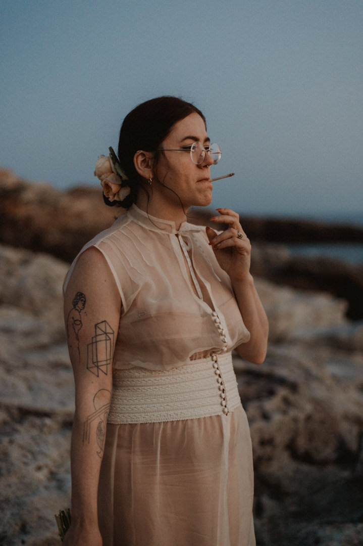low-key elopement in japan - bride having a tobacco