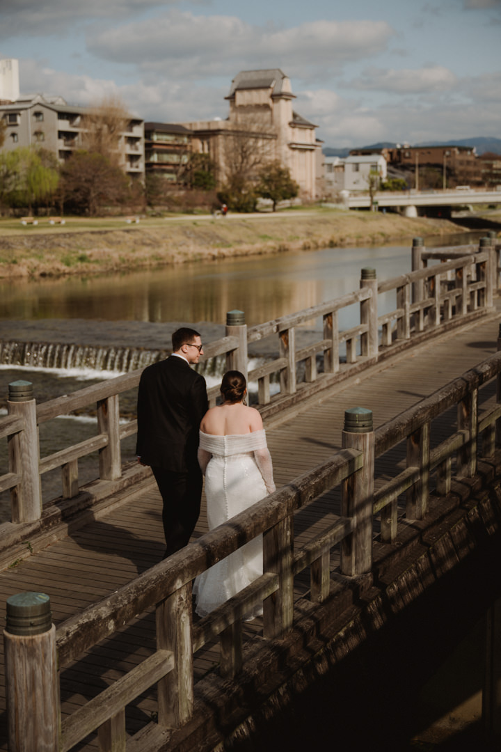 The couple walks along the river, Kyoto Garden Elopement